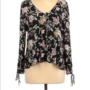 Black flowy floral blouse with open keyholes